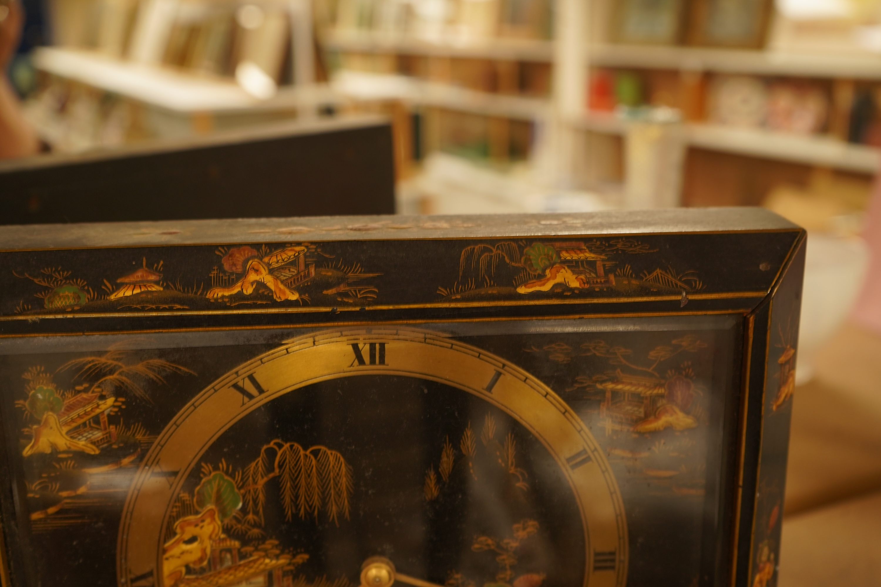 A Smith's electric chinoiserie lacquered mantel clock, 28cm wide